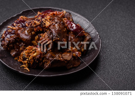 Chicken, duck, or goose liver with plums, onions, and spices. Chicken liver 138091071
