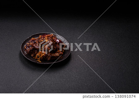Chicken, duck, or goose liver with plums, onions, and spices. Chicken liver 138091074