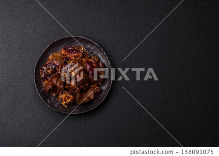 Chicken, duck, or goose liver with plums, onions, and spices. Chicken liver 138091075