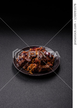 Chicken, duck, or goose liver with plums, onions, and spices. Chicken liver 138091076