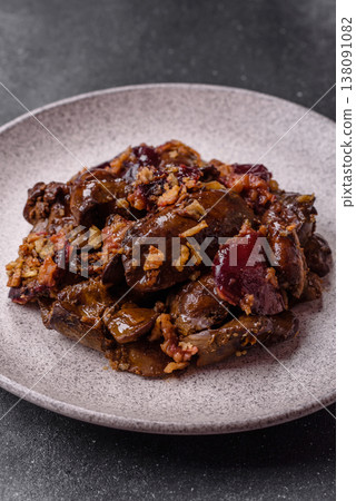 Chicken, duck, or goose liver with plums, onions, and spices. Chicken liver 138091082