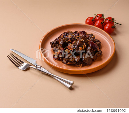 Chicken, duck, or goose liver with plums, onions, and spices. Chicken liver 138091092
