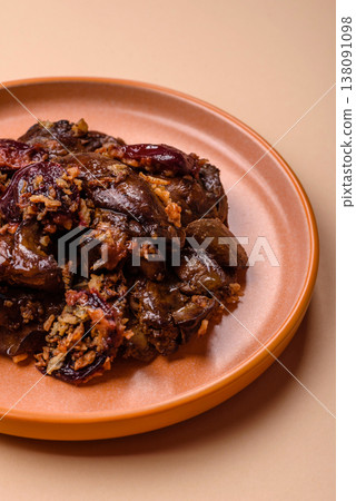 Chicken, duck, or goose liver with plums, onions, and spices. Chicken liver Chicken, duck, or goose liver with plums, onions, and spices. Chicken liver 138091098