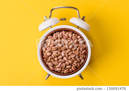 Salted pistachios in shells as a healthy food ingredient. Pistachios as a food background Salted pistachios in shells as a healthy food ingredient. Pistachios as a food background 138091476