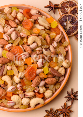 A mix of nuts and dried fruits as ingredients for a healthy meal. Nuts and dried fruits 138091507