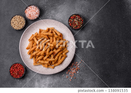 Croutons or crackers made from rye bread with garlic, salt, and spices. Croutons with salt 138091535