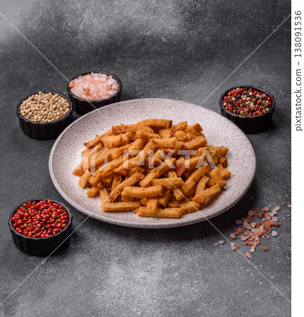 Croutons or crackers made from rye bread with garlic, salt, and spices. Croutons with salt Croutons or crackers made from rye bread with garlic, salt, and spices. Croutons with salt 138091536