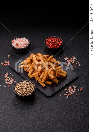 Croutons or crackers made from rye bread with garlic, salt, and spices. Croutons with salt Croutons or crackers made from rye bread with garlic, salt, and spices. Croutons with salt 138091549