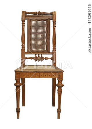 Classic wooden chair showcasing intricate craftsmanship and timeless design in a serene, uncluttered setting Classic wooden chair showcasing intricate craftsmanship and timeless design in a serene, uncluttered setting 138091656