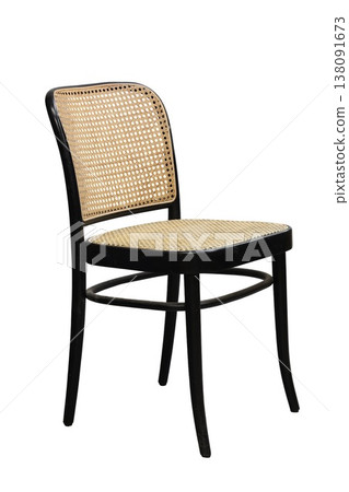 Elegant black and rattan chair perfect for modern and classic interiors in any cozy dining space or living room Elegant black and rattan chair perfect for modern and classic interiors in any cozy dining space or living room 138091673