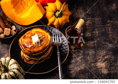 Pumpkin pancakes with maple syrup 138091705