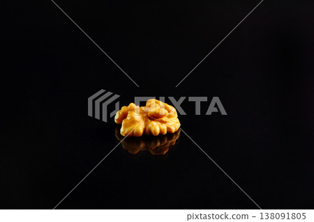 Walnuts on a black slate background. Close up. Walnuts on a black slate background. Close up. 138091805