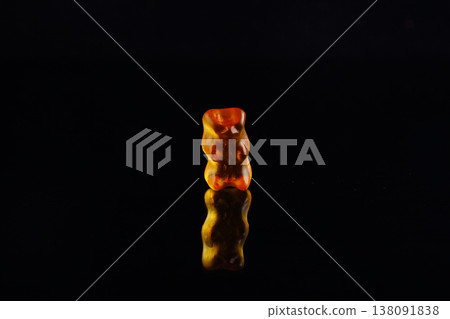 a photo of some sweets on a black background a photo of some sweets on a black background 138091838
