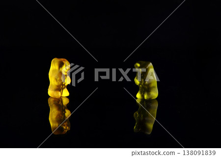 a photo of some sweets on a black background a photo of some sweets on a black background 138091839