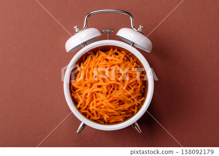 Spicy Korean carrot salad, grated with salt and spices, an Asian dish. Korean carrots Spicy Korean carrot salad, grated with salt and spices, an Asian dish. Korean carrots 138092179