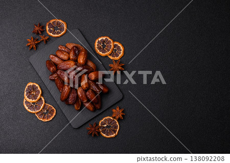 Dried dates on a ceramic plate for Ramadan or Iftar. Dates fruit as a background 138092208