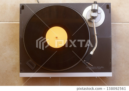old vinyl record with clipping path. DJ Turntable with Vinyl Record, Playing, Top View old vinyl record with clipping path. DJ Turntable with Vinyl Record, Playing, Top View 138092561
