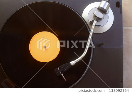 old vinyl record with clipping path. DJ Turntable with Vinyl Record, Playing, Top View old vinyl record with clipping path. DJ Turntable with Vinyl Record, Playing, Top View 138092564
