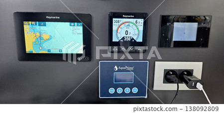 Raymarine navigation display panels with AquaPrime control unit on wall Raymarine navigation display panels with AquaPrime control unit on wall 138092809