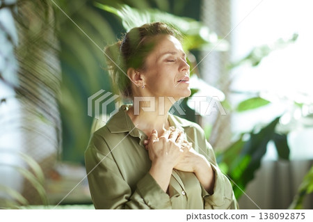 Woman Taking a Deep Breath for Stress Relief and Wellness Woman Taking a Deep Breath for Stress Relief and Wellness 138092875