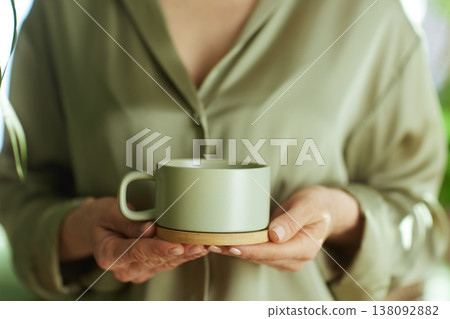 Minimalist Wellness Moment with Warm Beverage and Silk Textures 138092882