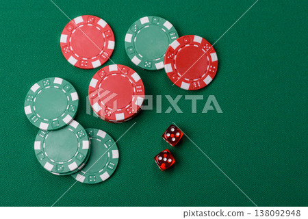 Casino dice and chips on a colored background, poker, gambling with bets. Dice and chips Casino dice and chips on a colored background, poker, gambling with bets. Dice and chips 138092948