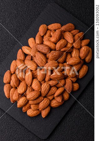 Raw and peeled almonds as a healthy food ingredient. Almonds as a food background Raw and peeled almonds as a healthy food ingredient. Almonds as a food background 138093002