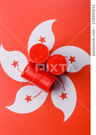 Metal barrels of oil, gas, or chemicals on the hong kong flag. Barrels of oil Metal barrels of oil, gas, or chemicals on the hong kong flag. Barrels of oil 138093032