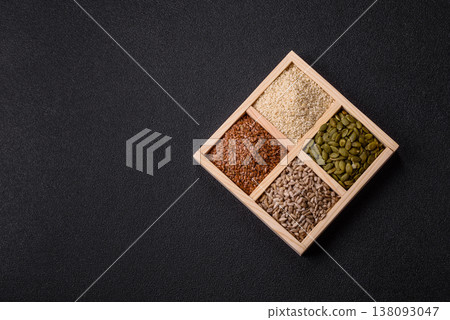 Flax, pumpkin, sunflower, and sesame seeds, ingredients for healthy eating 138093047