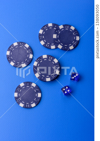 Casino dice and chips on a colored background, poker, gambling with bets. Dice and chips 138093050