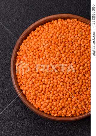 Raw red lentils as a source of protein for a healthy vegan meal. Red lentils 138093090