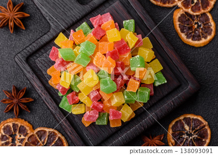 Candied fruit in colorful cubes as an ingredient for baked goods and sweets. Candied fruit Candied fruit in colorful cubes as an ingredient for baked goods and sweets. Candied fruit 138093091