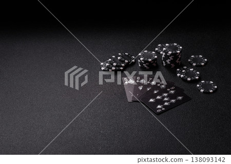 Playing cards and chips on a table, a gambling game of poker. Cards and chips Playing cards and chips on a table, a gambling game of poker. Cards and chips 138093142