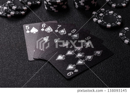 Playing cards and chips on a table, a gambling game of poker. Cards and chips 138093145