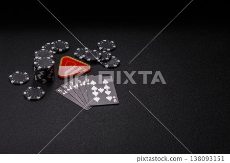 Playing cards and chips on a table, a gambling game of poker. Cards and chips Playing cards and chips on a table, a gambling game of poker. Cards and chips 138093151
