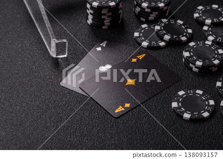 Playing cards and chips on a table, a gambling game of blackjack or baccarat. Cards and chips Playing cards and chips on a table, a gambling game of blackjack or baccarat. Cards and chips 138093157