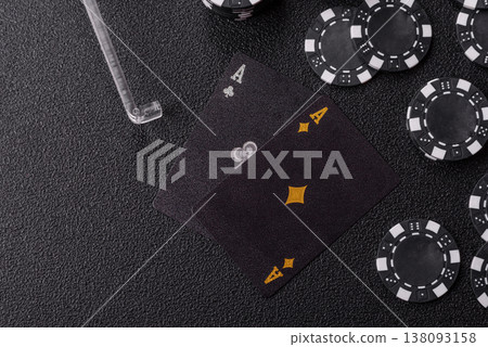 Playing cards and chips on a table, a gambling game of blackjack or baccarat. Cards and chips Playing cards and chips on a table, a gambling game of blackjack or baccarat. Cards and chips 138093158