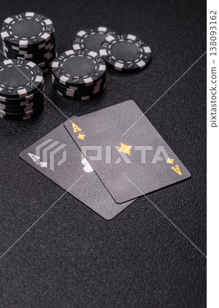 Playing cards and chips on a table, a gambling game of blackjack or baccarat. Cards and chips 138093162