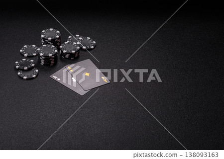 Playing cards and chips on a table, a gambling game of blackjack or baccarat. Cards and chips Playing cards and chips on a table, a gambling game of blackjack or baccarat. Cards and chips 138093163