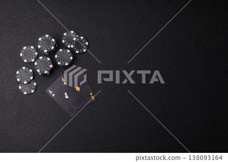 Playing cards and chips on a table, a gambling game of blackjack or baccarat. Cards and chips Playing cards and chips on a table, a gambling game of blackjack or baccarat. Cards and chips 138093164