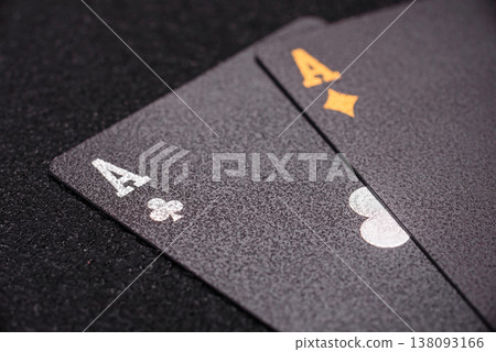 Playing cards and chips on a table, a gambling game of blackjack or baccarat. Cards and chips Playing cards and chips on a table, a gambling game of blackjack or baccarat. Cards and chips 138093166