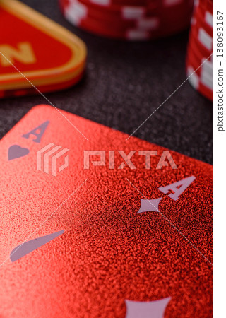 Playing cards and chips on a table, a gambling game of blackjack or baccarat. Cards and chips Playing cards and chips on a table, a gambling game of blackjack or baccarat. Cards and chips 138093167