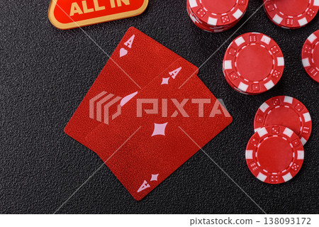 Playing cards and chips on a table, a gambling game of blackjack or baccarat. Cards and chips Playing cards and chips on a table, a gambling game of blackjack or baccarat. Cards and chips 138093172