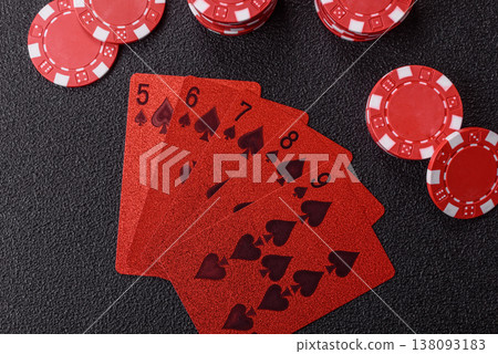Playing cards and chips on a table, a gambling game of poker. Cards and chips Playing cards and chips on a table, a gambling game of poker. Cards and chips 138093183