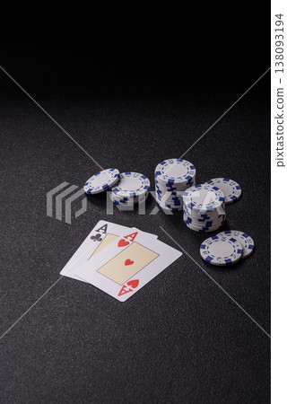 Playing cards and chips on a table, a gambling game of blackjack or baccarat. Cards and chips 138093194