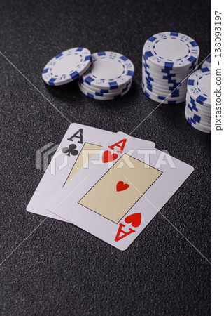 Playing cards and chips on a table, a gambling game of blackjack or baccarat. Cards and chips Playing cards and chips on a table, a gambling game of blackjack or baccarat. Cards and chips 138093197