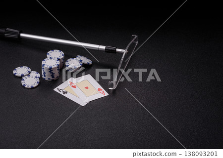 Playing cards and chips on a table, a gambling game of blackjack or baccarat. Cards and chips Playing cards and chips on a table, a gambling game of blackjack or baccarat. Cards and chips 138093201