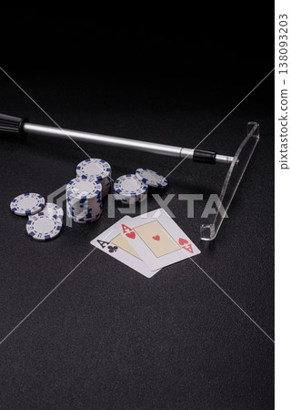 Playing cards and chips on a table, a gambling game of blackjack or baccarat. Cards and chips Playing cards and chips on a table, a gambling game of blackjack or baccarat. Cards and chips 138093203