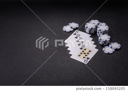 Playing cards and chips on a table, a gambling game of poker. Cards and chips Playing cards and chips on a table, a gambling game of poker. Cards and chips 138093205