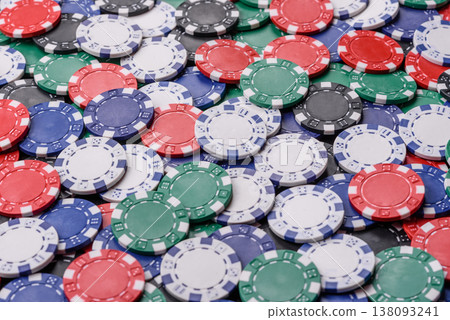 Multicolored casino chips as a conceptual backdrop for poker, blackjack. Multicolored casino chips Multicolored casino chips as a conceptual backdrop for poker, blackjack. Multicolored casino chips 138093241